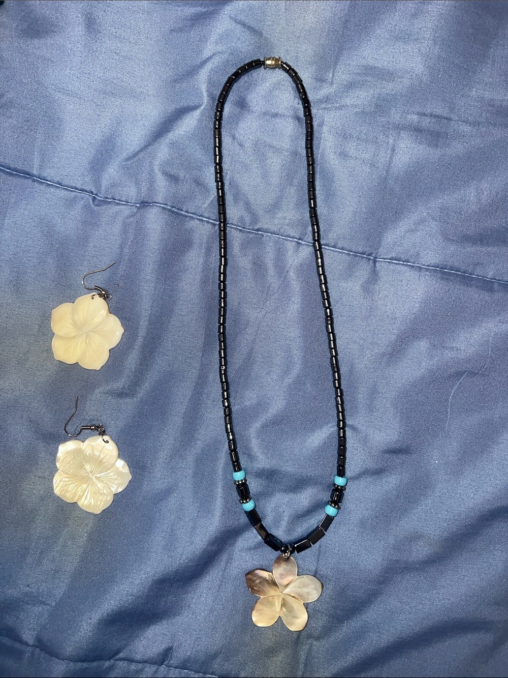 Handcrafted Black Beaded Necklace with White Flower Pendant